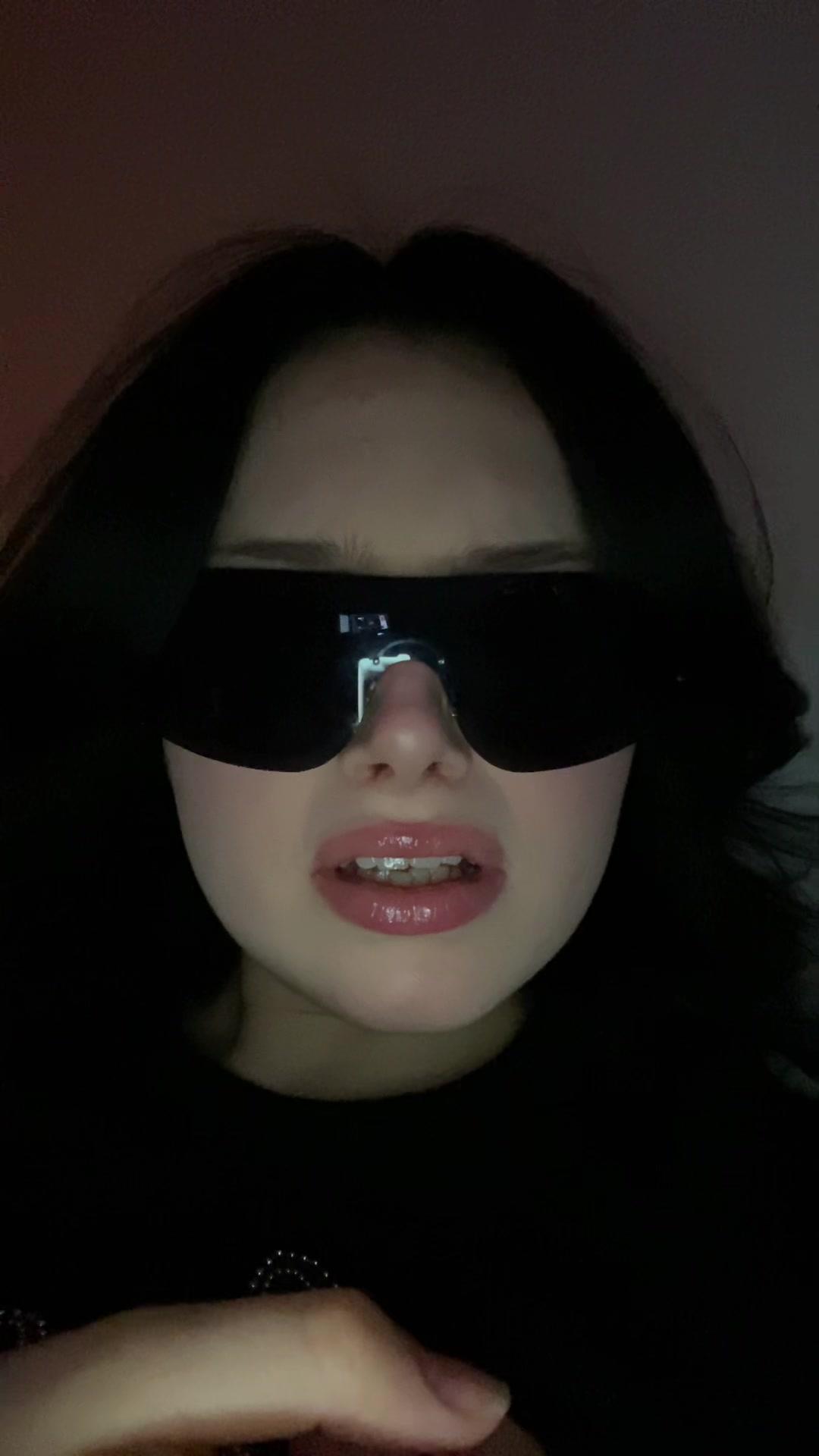 Kris confused in dark sunglasses
