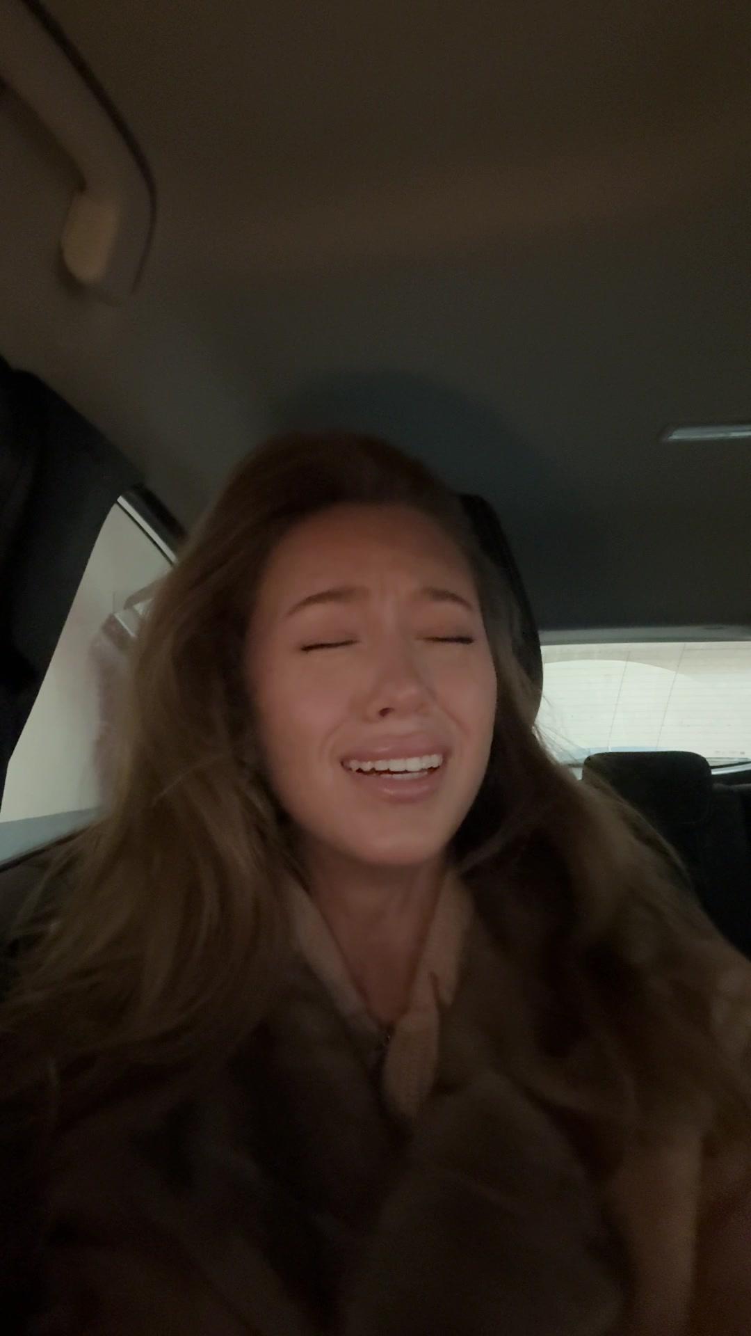 Woman Sneezes and Looks Around