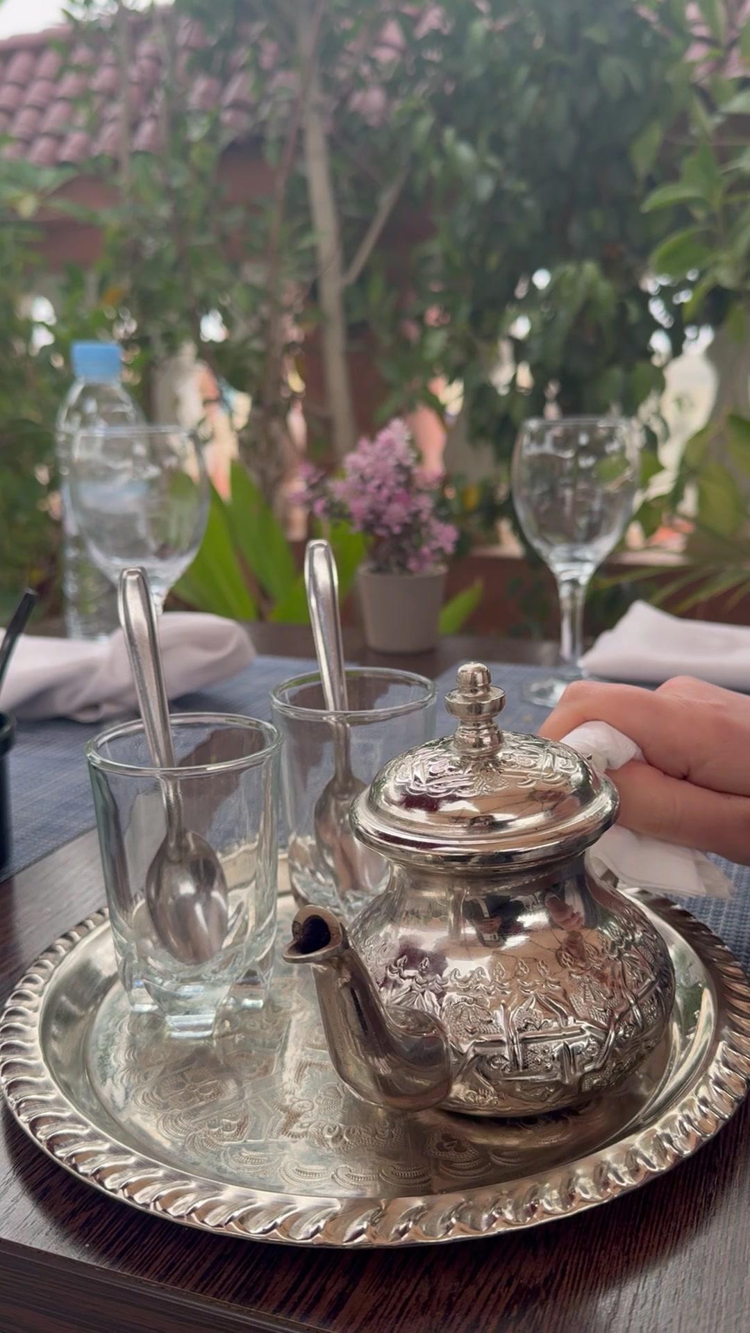 Pouring Moroccan Mint Tea Into Glasses