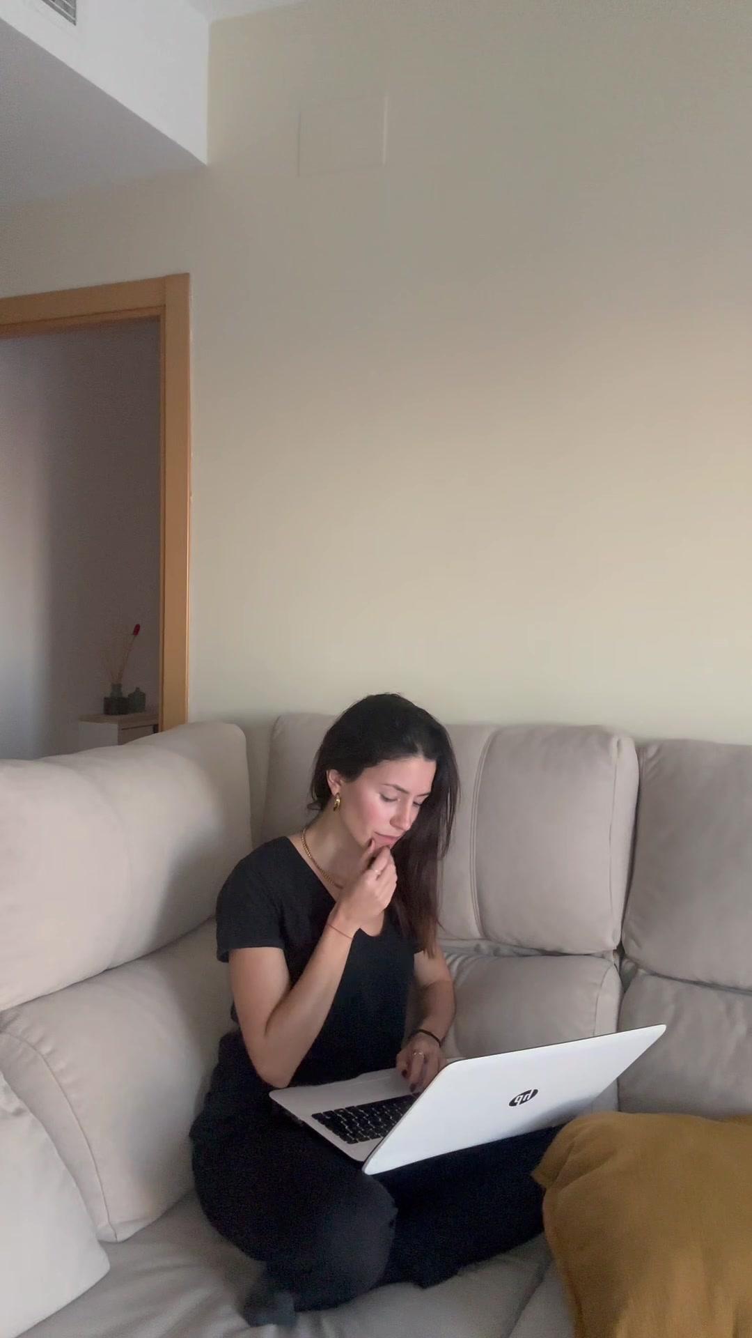 Woman Reacts Happily to Laptop