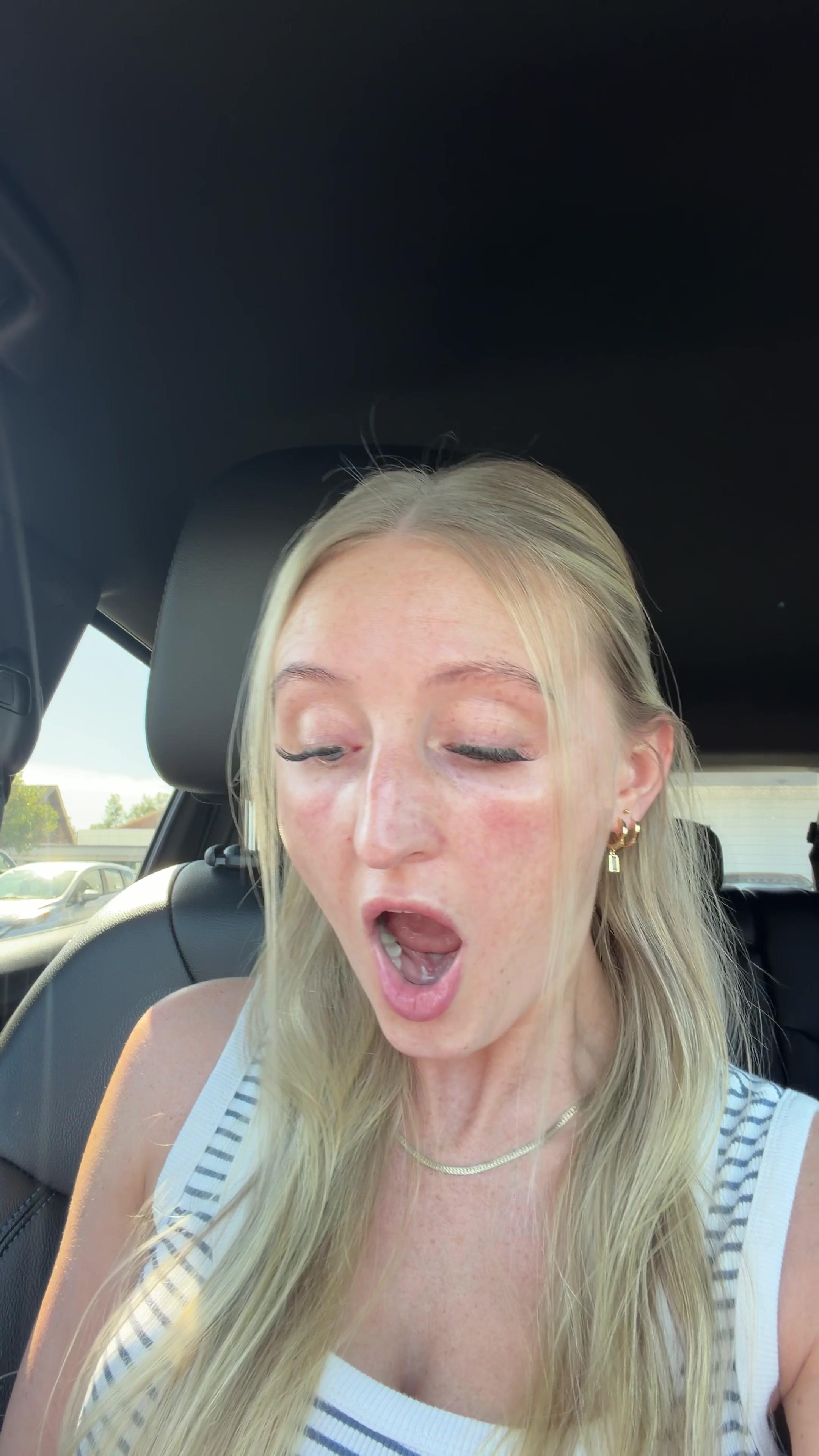Shocked Blonde Woman Gasps In Car