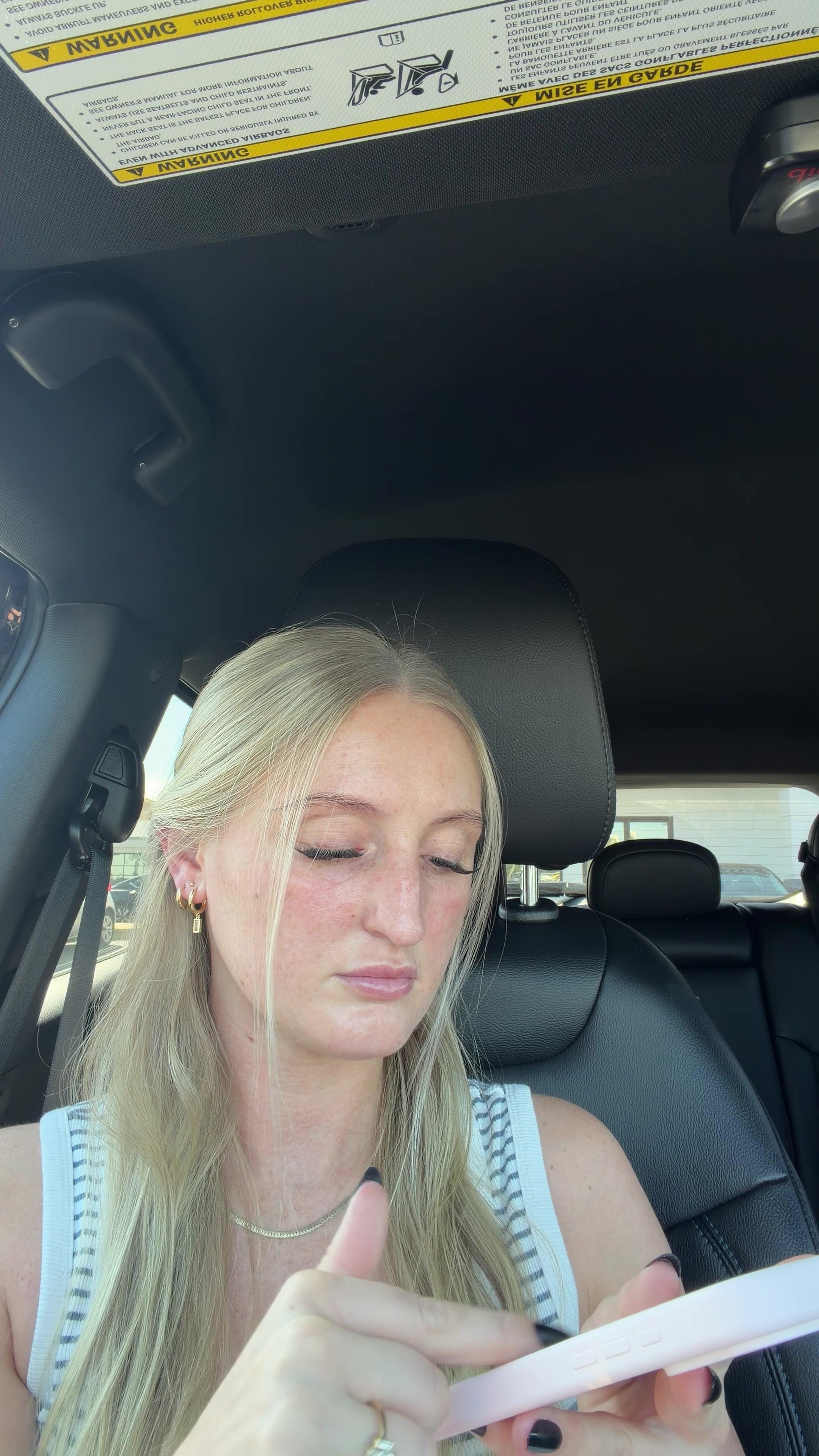 Woman in Car Gasps in Shock