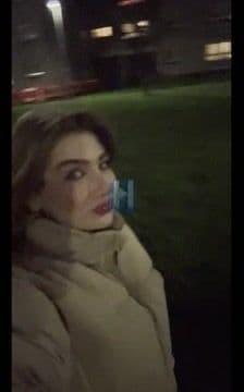 Woman Reacts to Something Outside